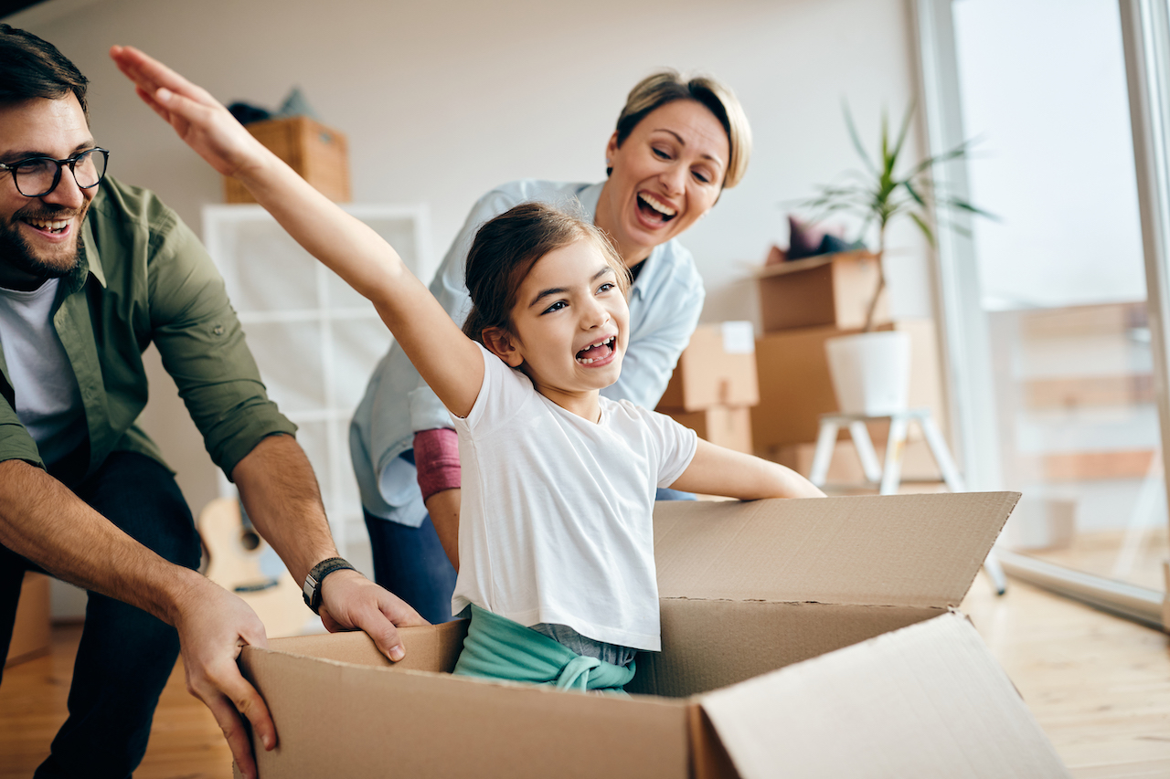 family having fun while moving