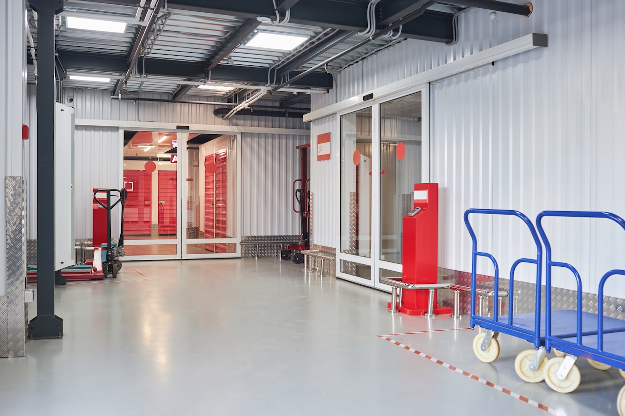 storage unit facility entrance with carts and unit doors