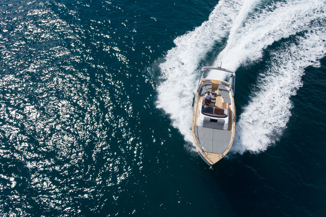 Aerial view of a motorbot on the water